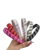 Borde ancho transfronterizo aros de pelo rayas de viento retro aros de pelo alto cranial aros de pelo premium sense paño tejido accesorios de pelo otoño invierno nuevo Item Picture